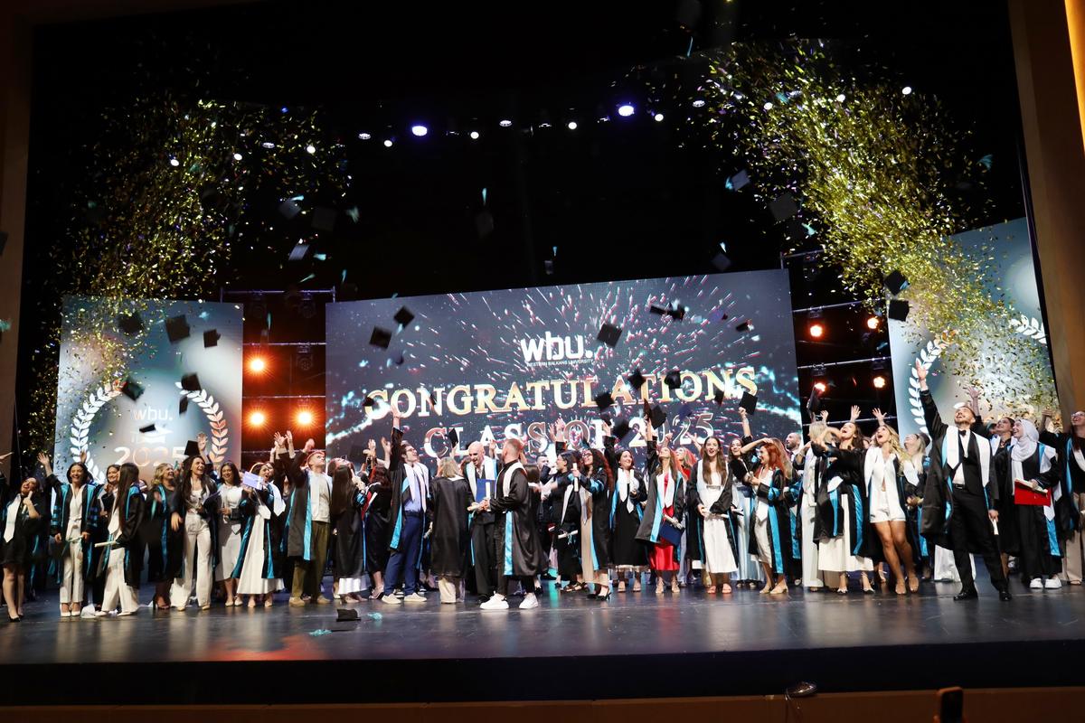 WBU’s first graduating class celebrating on stage at the 2025 graduation ceremony